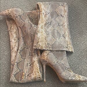 Elegant Snakeskin Heeled Boots